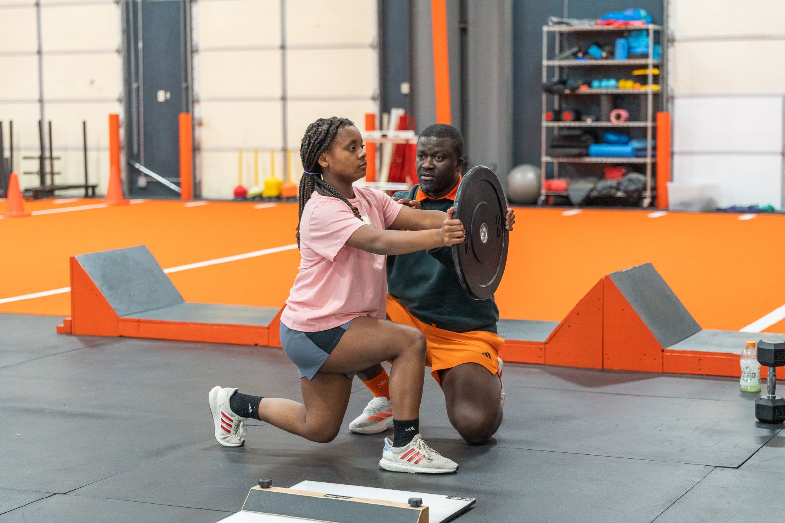 Coached plate carry